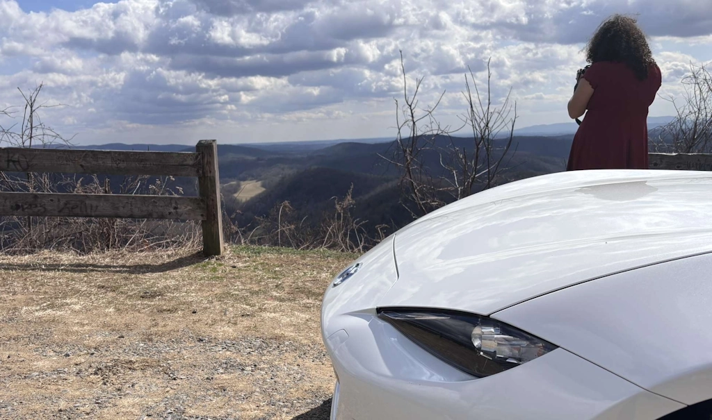 Trinity & Miata on a cliff
