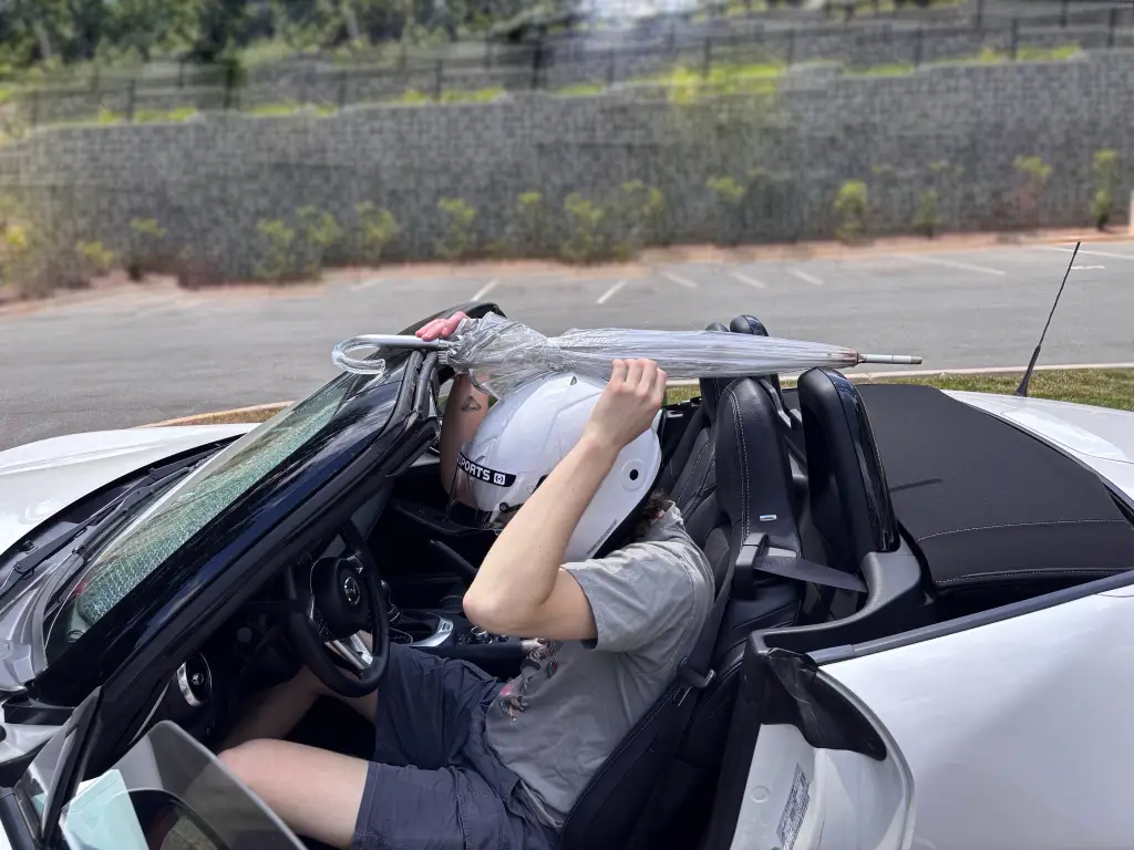 Checking to see if I fit inside wearing my helmet